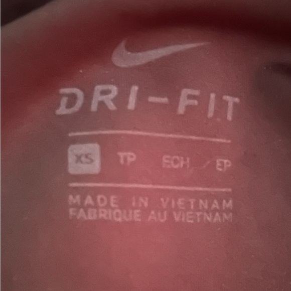 Nike dri fit leggings with small pocket and Nike logo in gold on leg - Picture 3 of 4